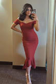Love this dress for a wedding I attended! There aren't any zippers but it's quite stretchy so slips on nicely! Pretty shade of burgundy red and lovely with the seasons changing from summer to fall soon.  Very figure-flattering. Easy to move around in and dance! Overall, happy with my purchase. - Nawaal F.