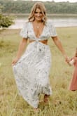 This dress was perfect for our family pictures. I loved the fit, but would've sized down to a medium if it weren't for my busts. - Lindsey W.