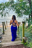 This dress was a stunner! The color is eye catching and the strap back brings a fun factor to the sophisticated and classy style. I had this dress hemmed to fit the length I needed for my height. Perfection! - Nicole E.
