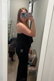 I purchased this outfit for a rehearsal dinner for a wedding that I am in, and it's perfect. Stretchy soft material that is so comfortable, and I thought it was very flattering on me. The loose part of the breast area is perfect as well for shading out my stomach. Very happy I decided to go with this outfit! - Kaitlyn B.