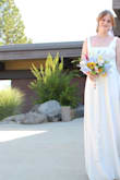 This dress was amazing and I spent weeks online looking for something in my budget that was still great quality. It was long even with heels but to be expected with a wedding dress so that's exactly what I wanted.  It snagged pretty easily at the bottom by the end of the night when I became less careful. But exactly what I needed and it was beautiful. - Kory O.