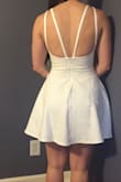 I love this dress and will wear it for my bachelorette party! The only thing that was kinda a down fall is that it too tight around my rib cage under my breasts. Then again if you are a weight lifter, I would get the next size bigger to feel a little more comfortable. And also I would add an eye- hook to the top of the zipper! - Lea B.