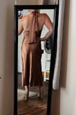 I loved this dress! I just wish it was in a different color for my skin tone! It didn't compliment my skin, but it was a really beautiful shade. I wish I could've pulled it off! - Jessica J.