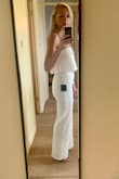 Such a lovely jumpsuit, very glam! It's a great fit with good rubber tack on the chest to keep it in place! Lovely heavy fabric so hangs beautifully. So pleased. - Tiffany S.
