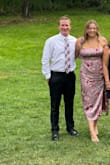 I'm normally a 12-14 with a large bust. You cannot wear a bra with this dress, and you must size up if you have a large bust. If you plan on wearing spanx, you'll have to roll the side with the slit because it is a high slit. I loved this dress and had so many compliments! - Olivia S.