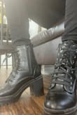 Had them for a week now so worn in! Truly love them! The Rubber Sole/heel is so comfortable and I worked in them all day. The quality is excellent for man-made and not flimsy - pretty solid boot! I read to go down a size in reviews but glad I didn't as it's just a tad large with a thin sock but nothing a thicker sock didn't fix. 3 inch heel gives the perfect lift for this 5'4 shorty! - Monique G.