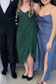 This was excellent for the fall wedding I attended. Great length and didn't show a crazy amount of thigh. I will definitely be wearing it again. - Amanda L.