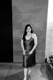 Fell in love with everything about this dress; it wrapped & flattered my curves while keeping everything else just as good. I always get compliments & looks for sure, total showstopper. Great fabric, quality, length & color. - Briselda A.