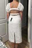 Bought this dress to wear at my Bridal Tea Shower and it's perfect. The lace is beautiful and great quality. The back is super flattering but the elastic in the back is a bit twisted. - Hailey R.