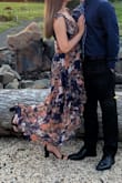 Loved this dress and got so many compliments. I got a medium and it was a little tight in the bust. I was able to make it work, but my bust was squished in. If you are a D cup or higher maybe try sizing up. 100% recommend. Great quality and beautiful - Madison T.
