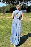Got so many compliments on this dress. I loved it! A little hard to zip up but once it was on it was perfect. - Maia A.