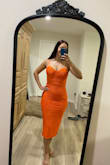 The dress is very flattering and comfortable. It has a good amount of stretch. I'm a 32DDD and the top fit perfectly. I'm wearing it to a wedding in a couple weeks. - Joliene P.