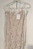 I wore this dress for my civil wedding, it fit me perfectly, size XS / 114lb, every detail of the dress was beautiful, I loved it, and I got many compliments& I recommend buying it!!! You won't regret it! Lulus always surprises me with how beautiful the clothes are and how good the material is. - Rosi K.
