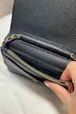Pleasantly surprised by the quality of this bag. It was very affordable (bought it during a sale!). It's a great staple to have and matches with every outfit. The inside isn't too spacious, but I can fit my iPhone Pro Max, car keys, lipgloss, and a few IDs/cards. Love the compartments on the inside and the fact that you can hide the strap. Highly recommend! - Lizon P.