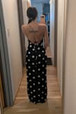 This dress is so flattering and so unique! I LOVE the back and the one shoulder scrunch detail. Perfect for my friend's rehearsal dinner! Slightly tight around my hips (I have a big butt) but I wouldn't go up in size because then it would be too big in my bust (I have a small bust). Also, the polka dots are more ivory than white which I love! - Kayla S.