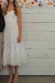 The 3D appeal of this dress was so cute. The corset back made it fit really well and added to the comfort level. I wore for my bridal shower and would 10/10 recommend!! - Mary B.