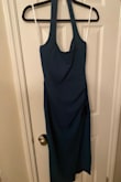 The dress was beautiful but it's a little too small. The model was wearing an extra small, and we are similar in size, so I thought that a small would be ok. 

I went with my second choice of dress because it fit perfectly! - Sophia P.