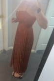 Beautiful color and design. Perfect fall formal event dress. 

I was a little concerned after reading initial reviews about zipper so wore out a few weeks before my event to make sure would hold up and it was fine. Hoping it will last through the rehearsal dinner I'm wearing it to in a few week as well. BMI is 33. I am 36DD and 140 pounds and was def a bit tight on the chest worse with sitting of course. Not much stretch so would def go up a size if non-proportionate to above or want chest to be looser/more comfortable. - Katie W.