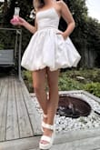 This was my first time ordering Lulus and I am very satisfied! Bought this for my bachelorette.
The dress needed a good steam when it arrived and it was too large for me to lace it in the back and for it to look nice so I decided to sew buttons instead. But the quality was great and I am happy. - Daphnee P.
