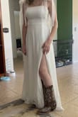 I absolutely love this dress!! It is so heavy it is almost the weight of my actual wedding dress, so I can tell that it's amazing quality. I will have to hem it about 2 inches though because it came really long. Otherwise, it fits perfectly! - Julia M.