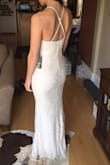 I ordered this dress to change into during my wedding reception, and it was perfect. The cream color, which at first I thought wouldn't work, is actually really nice and looked very bridal. The length is perfect with 3" heels. I was able to wear the stick on type bra that hooks in the middle, and it worked perfectly. The material is a very nice quality and the lace makes it so it isn't see through. I've been a consistent size small in Lulus dresses, this was no different.

The only downside is that with the adjustable straps in the back, it's tricky to get out of. I had to loosen them all the way in order to get my head back out. Otherwise, love it! - Heidi P.