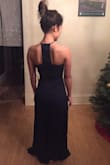 Ordered this as a potential bridesmaid dress, thought it was super cute! It was a nice dark shade of navy. A little long as Lulus dresses normally are. I didn't try it on with shoes, but it probably would have required at least 4 inches of heel. The style was very flattering, love the design of the top in front and back. I tried it on with a stick on bra that clasps in the front, and the clasp was barely visible. It could easily be hidden by pinning somehow. Unfortunately, the front was too revealing for what the bride is looking for, so it was a return. Would love to get one in the future just to wear as a guest to a wedding! It looks deceivingly like it might be revealing, but it's actually covers in the front pretty well. - Heidi P.
