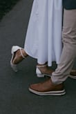 I am a true size 10 shoe and when I read the reviews I was hesitant to size a whole size down and I'm so glad I did. They are super adorable and am so happy to have worn them for my rehearsal dinner. With sizing down though the strap around my ankle was tight but still wearable. - Hannah T.