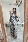 Love it! I am short so I did have to have it taken in on the bottom. I received so many compliments. Can't wait to wear it again. - Brenda V.