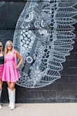 I had so many compliments on this dress! I wore it to a bachelorette weekend and it came out super cute. I bought a small and it fit, but was snug - loved it so much I exchanged it for a medium and so glad I did. Comfortable too! - Samantha S.