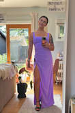 I got this dress for my best friend's wedding in October. It's so flattering and fits like an absolute dream. I'm 5'4" around 130 lbs and wearing a size small. Other than maybe needing to take them hem up a little depending on what shoes I go with, it's seriously perfect. The material hangs really nicely and doesnt seem like it will be prone to wrinkling. It's got a medium weight to it but feels breathable (especially with the open slit). I think it would be a good option in any season. - Natasha V.