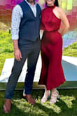 I was a little iffy about the asymmetrical look, but my fashion conscious teenage son assured me it added to the stunning look. I loved the loose top and fitted waist, giving the illusion of a tiny waist. The dress flowed beautifully and was perfect for dancing in. - Amy T.