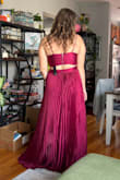 I really liked this dress but I don't think it was perfect for me. It was a little long without heels and the top didn't give much support. The material was good and I really liked the color though! I did end up returning it because of the length and fit so I don't know how it holds up. I'm sure it would work great for someone else. - Erica B.