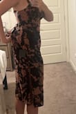 I ordered this dress in a medium and large because of other reviews. The medium fit but only if I'm standing- when I tried to sit it got so uncomfortably tight and it felt like it was going to rip. The large fits and I'm able to tighten the bust by tying it carefully to not rip the fabric. I might have it tailored to take it in slightly on the lower back as it looks and feels too loose there. Pics are with no bra, I plan on wearing a "gather all" brand sticky bra with this dress. - Dylan N.