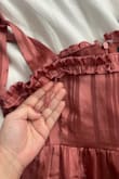 Super cute dress. Through out the night the threads started unraveling and falling apart. Very disappointed considering how expensive these dresses are. - Honorata S.