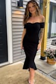 Felt so polished and classy in this dress! The dress was comfortable all night, a decent amount of stretch. The arm straps didn't ride up all night, which was something I worried about, they stayed in place. Really love this dress, well worth the purchase, and will wear it again! - Blake S.