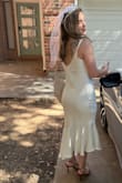 I was nervous because the photos were only from a styled shoot and not just a model with a blank background. I love how it fits the body it's simple & cute. - Serena M.