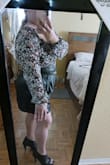 I bought this blouse in large , it was a little tight from waist has no stretch.  Exchange it for X - Large , the sleeves were too long .
Took it to my tailor to fix it.
Looks beautiful. - Dalila S.