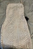 I order 3 different dresses that way I could see which one I liked the best and I ended up going with this one. It is very cute and not too short. - Lorelei G.