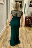 It is a pretty great dress, but I think I need to order down a size as this cut of dress is not for my figure.  The green is nice, the lining is a bit too big so it kept bunching so Id have to smooth it and that for me was the nail in the coffin so back it goes. - Michelle A.