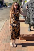 This dress got lots of compliments at a family wedding. I also wore it for my anniversary dinner. The material flows well and the adjustable straps make the top piece versatile with the cowl neck. Easy to accessorize. Love it! - Hillary M.