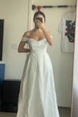 This is definitely a beautiful dress, but it just didn't work for me. I ordered three different dresses in size small and extra small, and this was the only dress that was small and big on me. For other dresses, I liked extra small, but I could not close the back all the way up, so small was my size except this dress. This was a little big on me, and my torso looked bigger than when I tried a more slimline dress. This kind of design has always been my dream dress, but after trying different styles, I realized this type of shape was not for me. I recommend trying different styles bc you never know! Although it didn't work for me, the fabric is so soft, and it is a stunning dress. - Jeemin J.