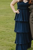 I received so many compliments on this dress!! It fit perfectly and it is such good quality. Had to steam each layer of the dress, but it looked so pretty! - Ann M.