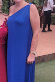 I knew when I saw this dress that I wanted to wear it to my niece's wedding. The elegance of the style and flow was perfect for a day wedding, food, dancing with the stars. I followed the size chart and ordered an XXL per the chart.  I normally wear L or XL.  Definitely it was too big so I ordered both a L and XL in order to have a dress for our departure.  I kept the L and wore without the tie belt. This is my first order with Lulus, it will not be the last. Thank you for having this dress available, I love it. - Stephanie C.