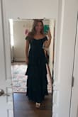 This dress is stunning. I got a ton of compliments on it and got asked several times where it was from. It's not uncomfortable and stayed on while I was dancing. It also did not drag on the ground while I wore heels. Definitely better for smaller-chested women - like myself. - Megan C.