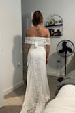 I am eloping soon with my fiancé. I probably tried on over 30 dresses. Some were beautiful but too expressive, others just were missing something. I bought a bulk of dresses from Lulus but still was not really in love but was running out of time. This dress showed up last minute and I was speechless. I'm a little self-conscious with my body but this dress flatters me SOOOO well. It's gorgeous and feels like great material. It's a bit long and I dont plan to wear super high heels but I don't mind, I love the train, the size runs a bit small but I also don't mind because it flatters me. I wish I could submit more photos to show a better view :( - Monica D.