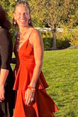 The gown was an absolute dream!  The material felt like butter and was so luxurious. The craftsmanship was flawless. The fit was perfect - like it was tailored just for me.  I received countless compliments.  The color was stunning for a fall wedding.  This dress was a perfect match for a magical day.  Please note - I did take the dress to dry cleaners to be pressed. - Christeen I.