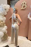 Absolutely loved this jumpsuit! Wore for my bridal shower and received so many compliments! So elegant and classy, love the bow in the back. - Lauren F.