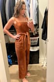 I really love this jumpsuit! It's flattering and the corduroy feels quality. I feel like it's a fine line between baggy and a camel toe situation with most jumpsuits, so this one having adjustable straps is helpful!
I was SO bummed to realize only after I had washed that one of the straps was sewn on wrong with a twist between where it attaches in the front and the back. I spent 20 minutes working the twist through the buckle thing so it is under the strap when worn and not super noticeable but still mega annoying and I would have exchanged had I realized this sooner. - Leighann C.