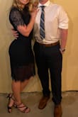 I own this dress in navy and forest green, both size small. It is classy and versatile, and just a little bit sexy. Not much stretch to the Material but is true to size. The under-layer tends to ride up so it may be beneficial for those like me with curvier hips to size up if you are going to be dancing or walking a lot. When I bought these I tried sizes small and medium, and the medium hip/booty area was perfect but it was way too loose in the waist for me (hourglass shape). Indoors it is not see through at all but unfortunately, once we took photos outdoors I noticed my black underwear was visible through the green dress. Not an issue with the blue. So wear nude or the same color underwear when you wear this to be safe. Overall, Highly recommend this dress! - Annika S.