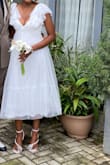 It looked so good and gave the vibe I wanted. It was perfect for my civil ceremony, it runs a little on the big side (I should have ordered a size down) but I made it work. - Ifeoma I.